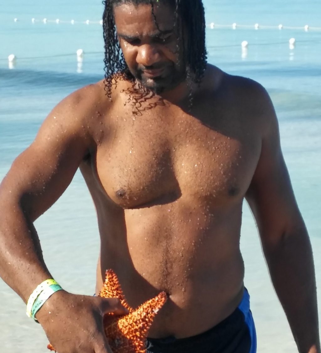 Roger With Starfish AT 7 Miles Beach